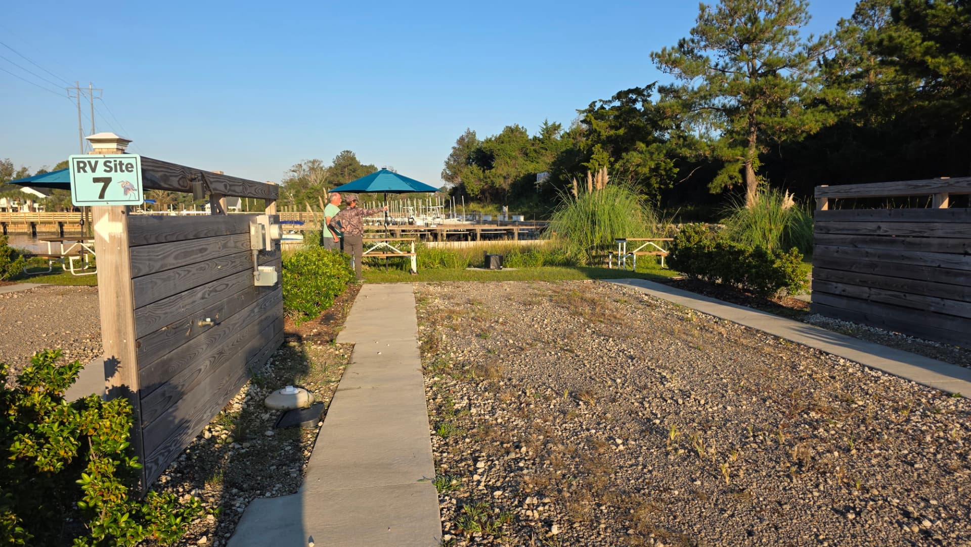 Gravel RV pad at Core Creek site CCR8-108 beside the marina waterfront