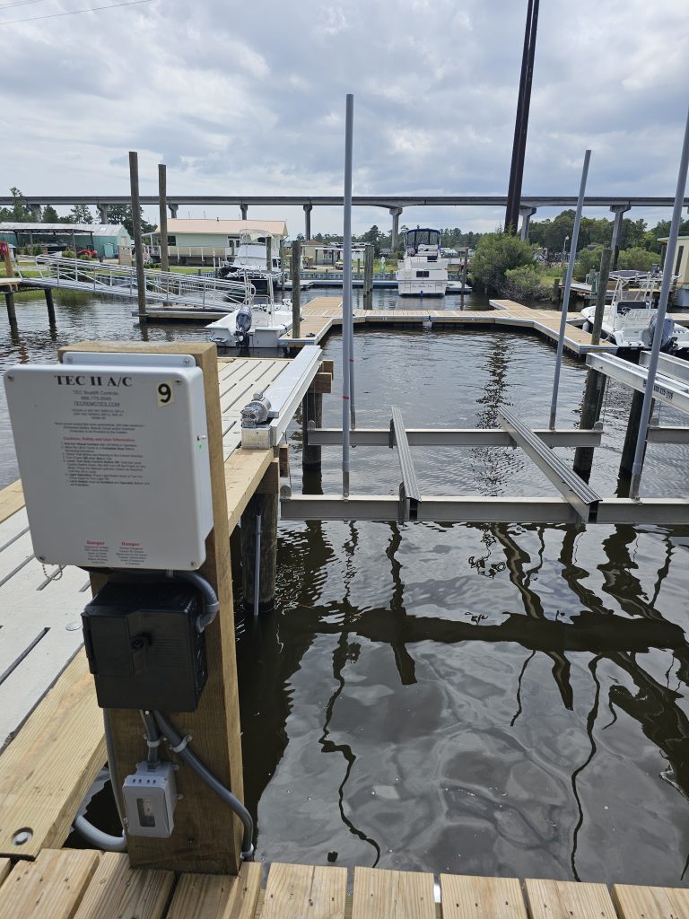 Boat lift and dock at Core Creek Marina