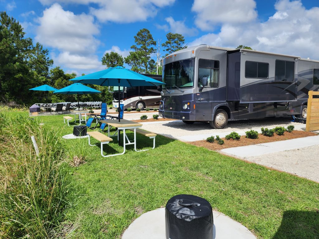Big-rig motorhome parked on a marina-front site